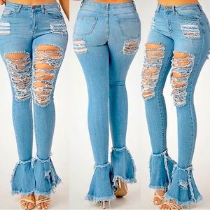 Ripped skinny bell bottom jeans available in blue or black. Sizes range 3XL-S
